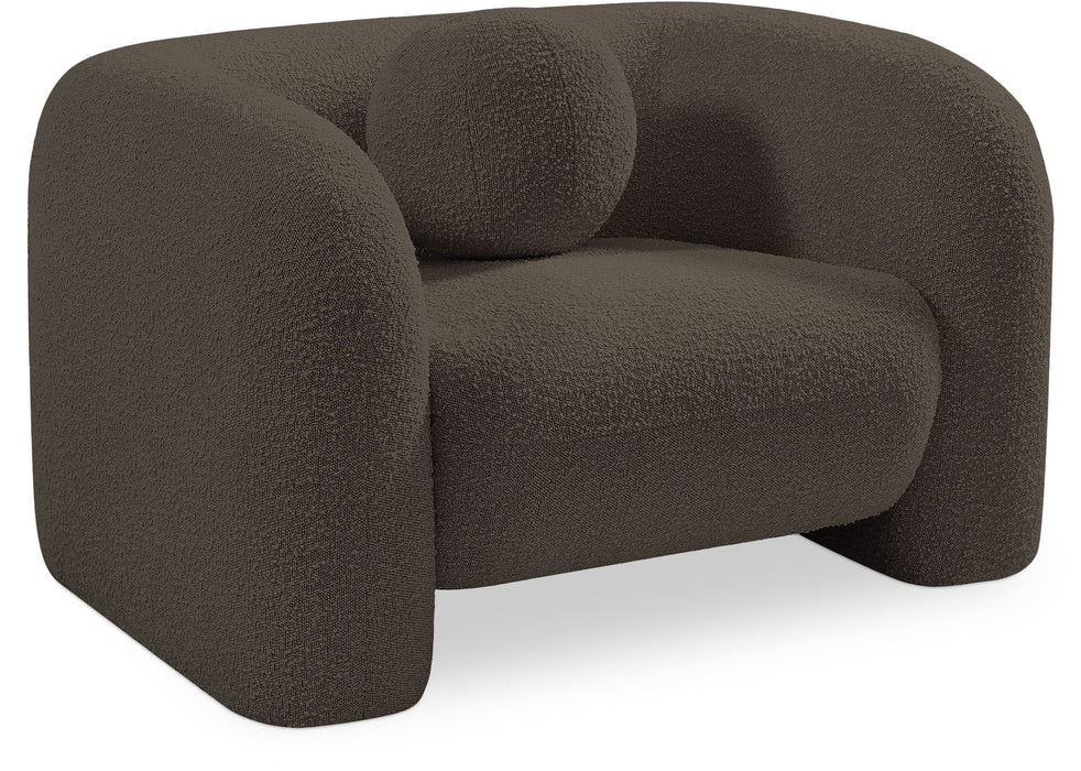 Cream-colored Meridian Furniture Emory arm chair with plush upholstery and wooden legs, perfect for living room seating.