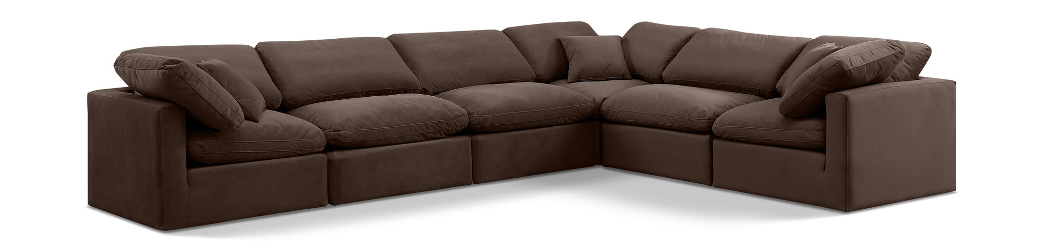 Velvet Meridian Furniture Indulge 6-piece modular corner sectional sofa with plush cushions and sleek design in a modern living room.