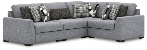 Benchcraft Bealton 4-piece stationary sectional sofa with plush cushions and modern design, perfect for contemporary living rooms.