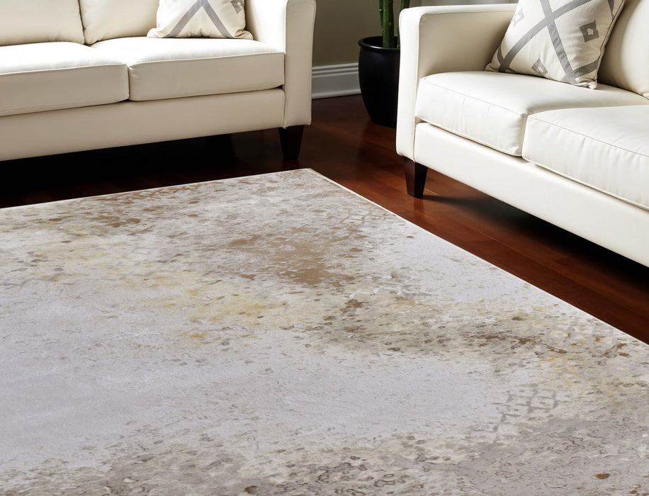 10' x 13' Abstract Power Loom Worn Faded Area Rug - Tan And Ivory