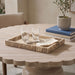 Marble tray with gold handles from Meridian Furniture's Hannah collection, featuring a sleek, polished genuine marble surface.