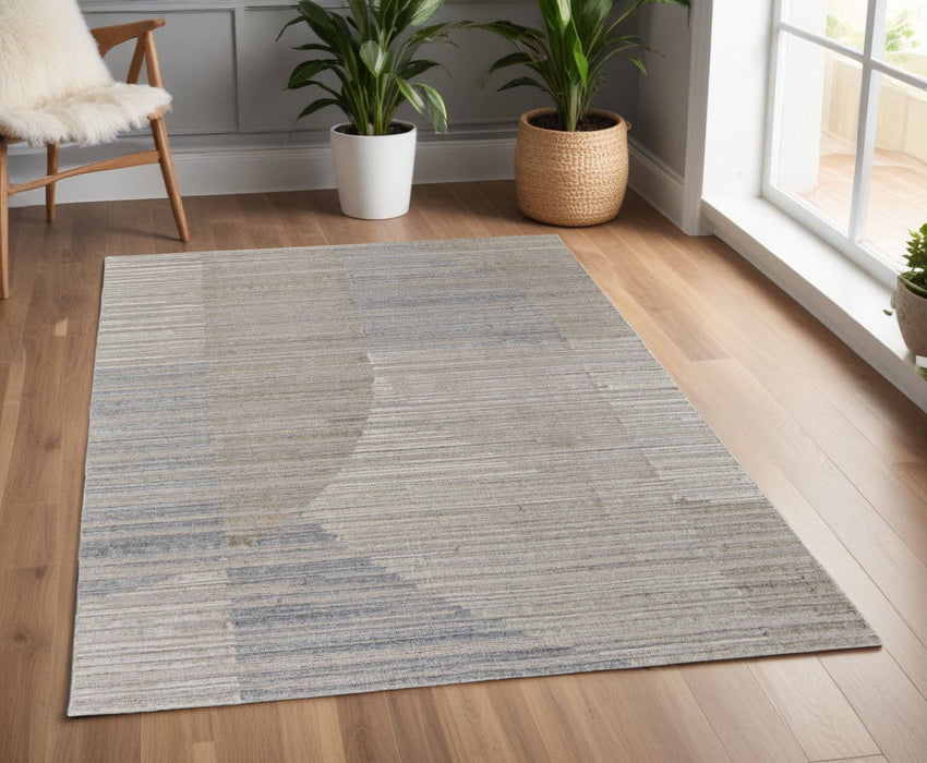4' x 6' Abstract Hand Woven Worn Faded Area Rug - Tan And Blue