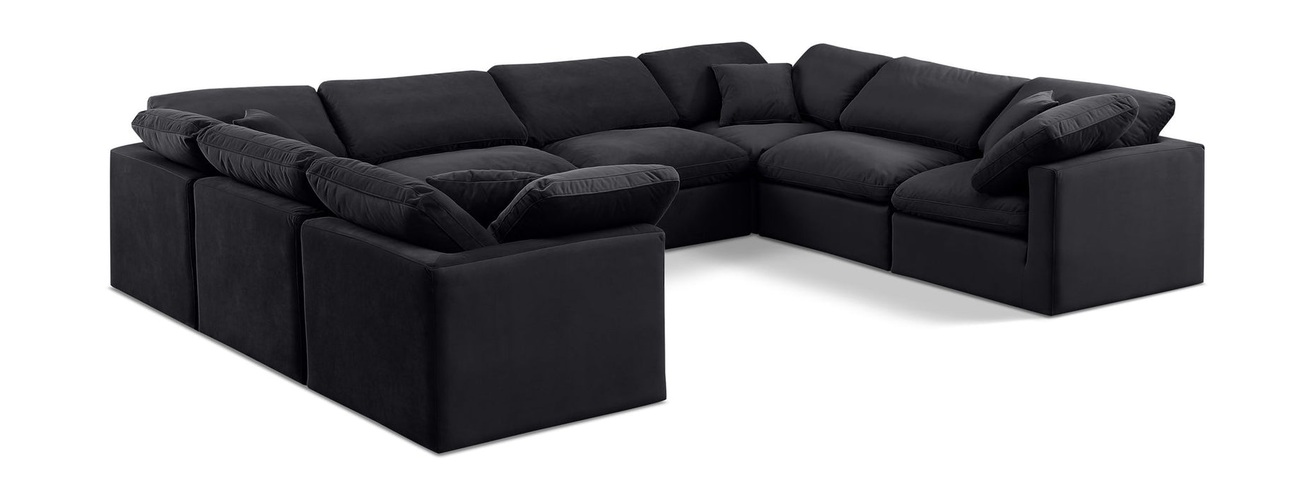 Velvet Meridian Furniture Indulge 8-piece modular sectional with plush cushions and modern design, arranged in a spacious living room.