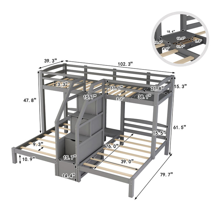 Gray Giga twin over twin bunk bed with built-in staircase, storage drawers, and safety rails in a modern bedroom setting.