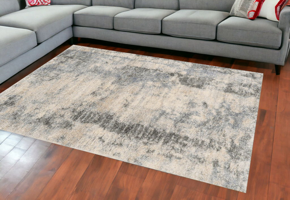 9' x 13' Machine Woven Abstract Indoor Area Rug - Ivory Blue