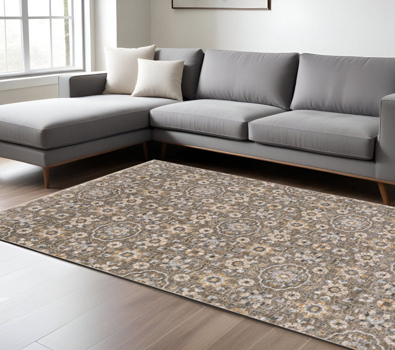 8' x 11' Floral Power Loom Stain Resistant Area Rug With Fringe - Gray And Tan