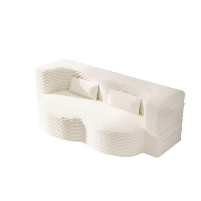 Giga floor sofa with two pillows and convertible twin size mattress, ideal for living room seating and lounging.