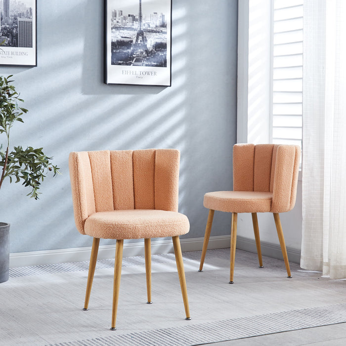 Set of 2 Giga modern dining chairs with wood-colored iron tube legs, cushioned seats, and comfortable backrests for dining and living rooms.