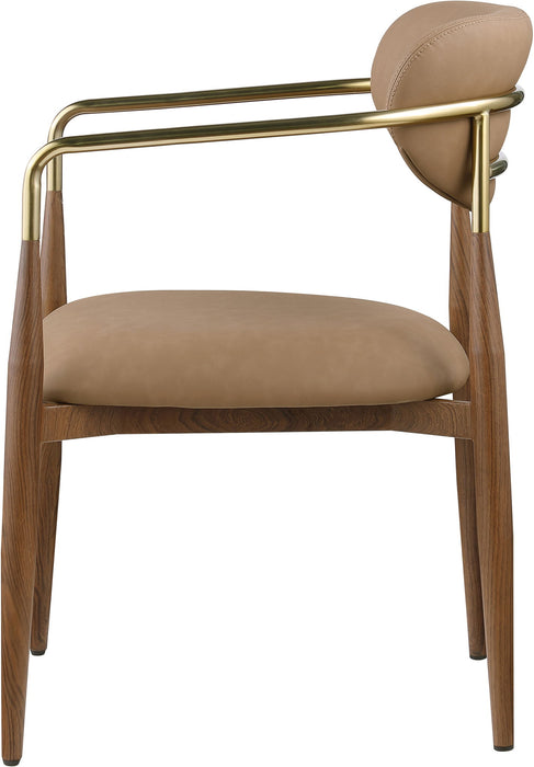 Vegan leather upholstered dining arm chair with walnut legs from Meridian Furniture, modern design and comfortable seating.