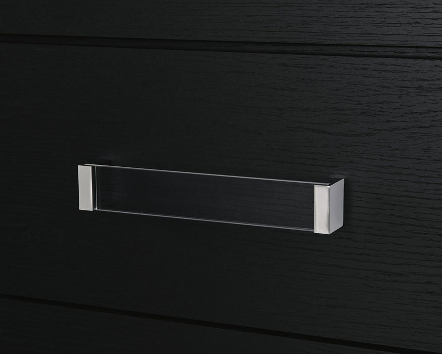 Signature Design by Ashley Maeling six-drawer dresser with sleek wood finish and modern hardware for stylish bedroom storage.