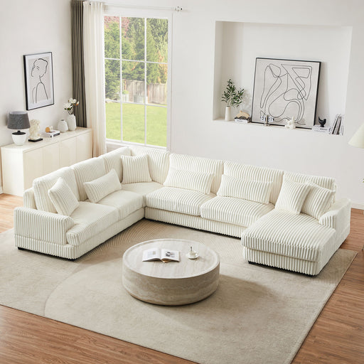 Giga oversized U-shaped sectional sofa with chaise lounge, modern upholstered living room couch, stationary design, soft fabric finish.