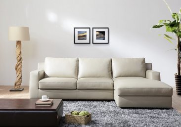 Jenny Premium Leather Sectional Sleeper in Beige In Right Or Left Hand Facing Chaise.