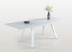 Contemporary Malibu outdoor extendable dining table by Chintaly in matte white aluminum with butterfly leaf for outdoor dining.