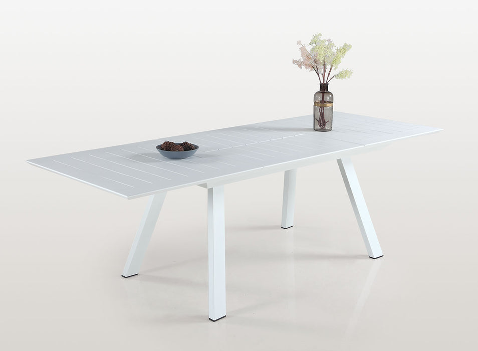Contemporary Malibu outdoor extendable dining table by Chintaly in matte white aluminum with butterfly leaf for outdoor dining.