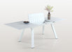 Matte white aluminum Malibu outdoor extendable dining table with butterfly leaf by Chintaly, perfect for outdoor dining spaces.