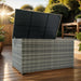 Giga outdoor wicker storage box with lid, used for storing kids toys, pillows, towels, and outdoor cushions on a patio deck.