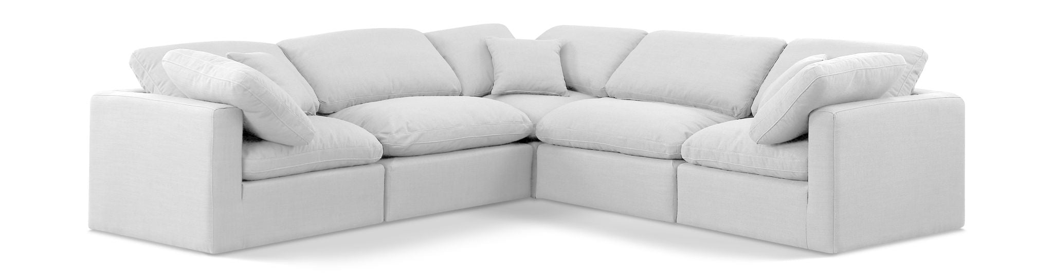 White Meridian Furniture Indulge Linen 5-Piece Modular Corner Sectional sofa with plush cushions and modern design.