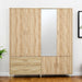HomeRoots 71-inch wood wardrobe with four doors and two drawers in natural finish, showcasing the spacious storage and classic design.
