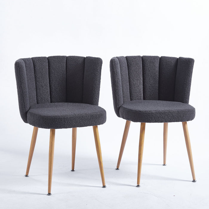 Set of 2 Giga modern dining chairs with wood-colored iron tube legs, cushioned seats, and comfortable backs for dining or living rooms.