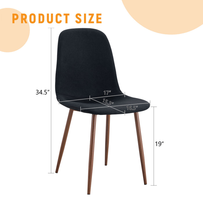 Set of four Giga luxury simple dining chairs with black metal legs, linen cotton upholstery, and walnut finish wood accents.