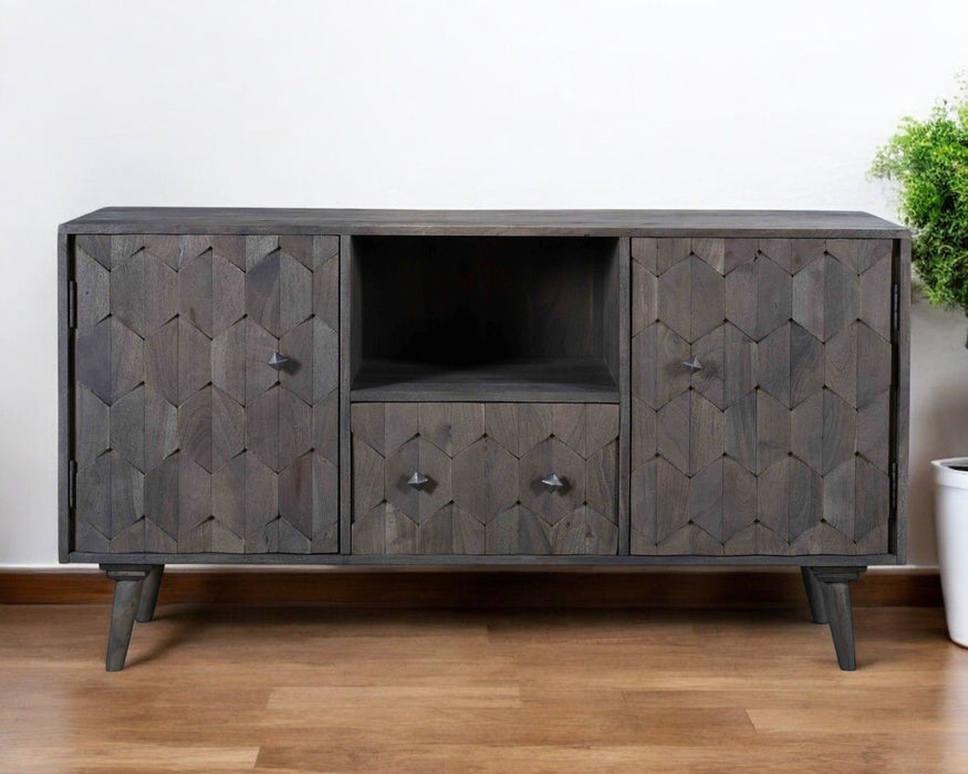 Dark gray 55-inch carved geometric distressed wood TV stand with open and enclosed storage from HomeRoots.