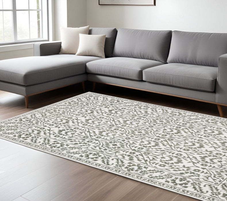 7' x 10' Floral Power Loom Area Rug - Gray And White