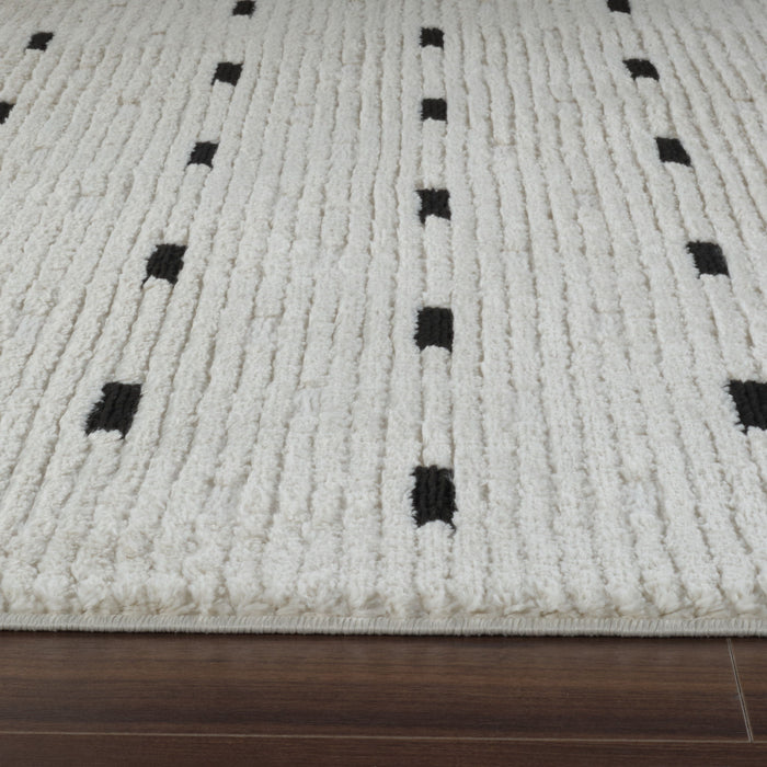 8' x 11' Abstract Distressed Polypropylene Area Rug - Cream And Black