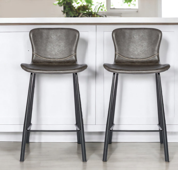 Set of two gray and black steel low back counter height bar chairs by HomeRoots, featuring modern design and sturdy metal construction.