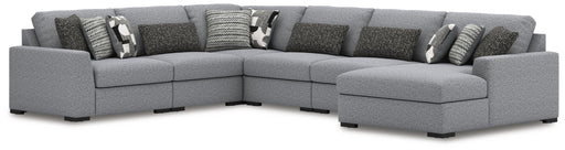 Benchcraft Bealton 6-piece stationary sectional sofa with plush cushions and neutral fabric upholstery, ideal for modern living rooms.