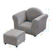 Gray kids velvet upholstered stationary chair with matching ottoman, featuring a plush seat and sturdy wooden legs.