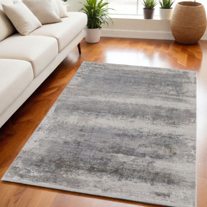 5' X 8' Abstract Power Loom Area Rug With Fringe - Gray