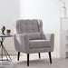 Giga modern upholstered accent armchair with soft padding, wooden legs, pillow, perfect for living rooms or bedrooms in small spaces.