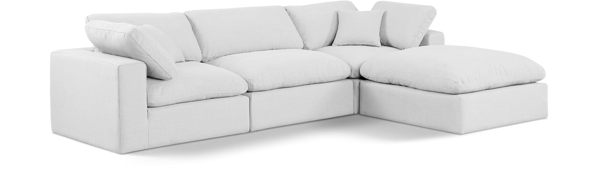Meridian Furniture Comfy 4-piece linen fabric modular sectional with chaise, featuring plush cushions and modern design.