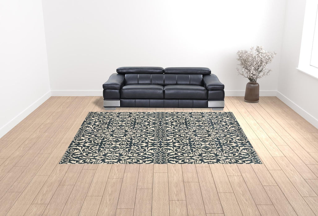 9.8' x 12.8' Floral Power Loom Stain Resistant Area Rug - Blue And Ivory