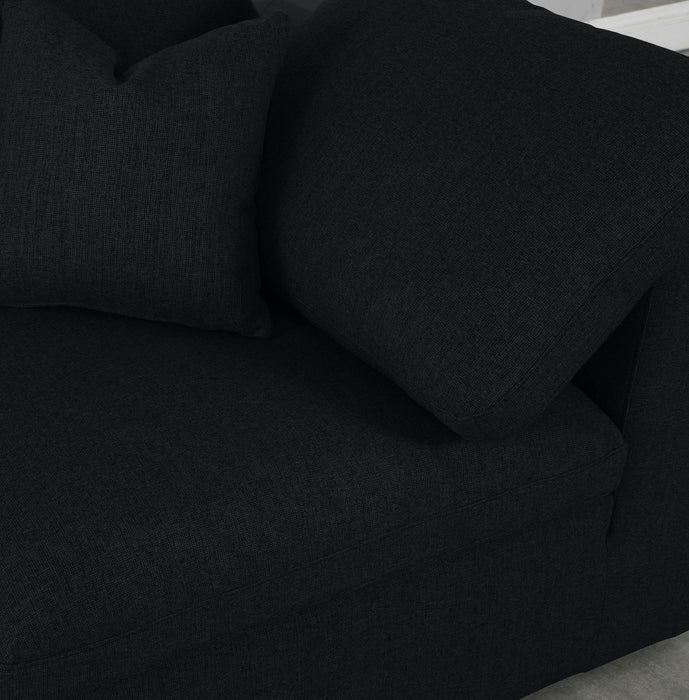 Meridian Furniture Serene corner chair with plush cushions and modern design, perfect for cozy living room corners.
