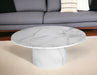 HomeRoots 35-inch round marble and wood pedestal coffee table with white finish, featuring a sleek and modern design.