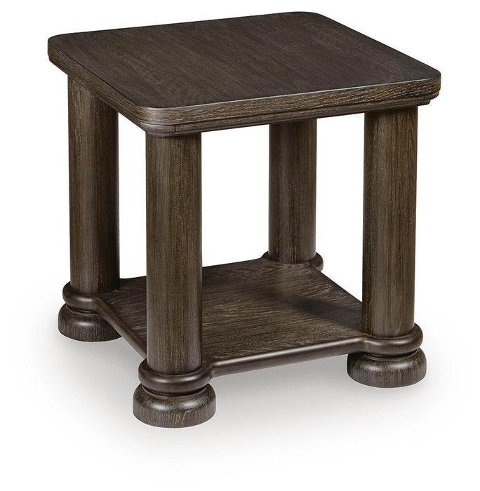 Rectangular cocktail table from Signature Design by Ashley, featuring a sleek wood surface and sturdy legs.