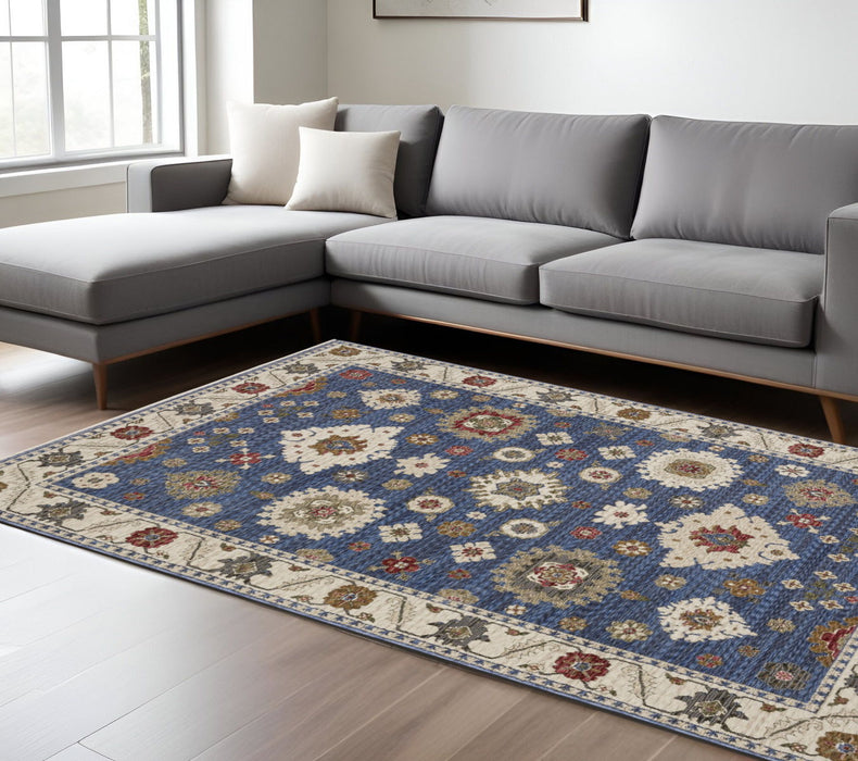 7' X 10' Floral Area Rug With Fringe - Blue And Ivory