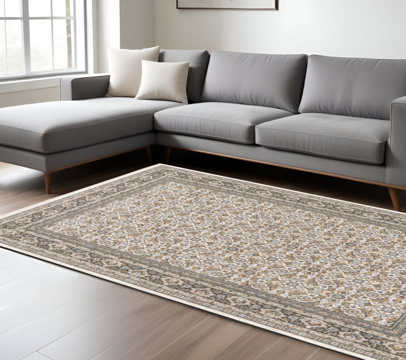 6' x 9' Oriental Power Loom Stain Resistant Area Rug With Fringe - Ivory And Gray
