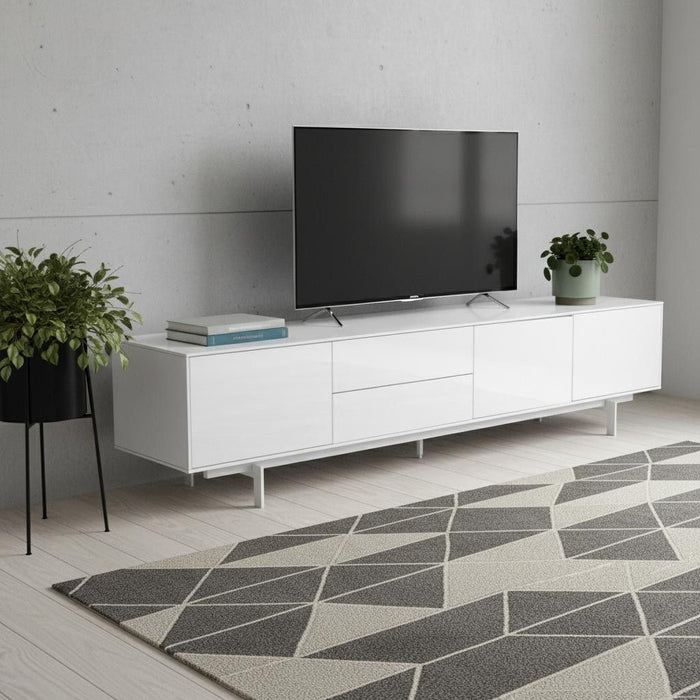 White manufactured wood TV stand with enclosed storage and open shelves, designed by HomeRoots for modern living spaces.