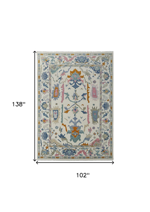 8' x 12' Wool Floral Hand Knotted Area Rug With Fringe - Blue Ivory And Pink