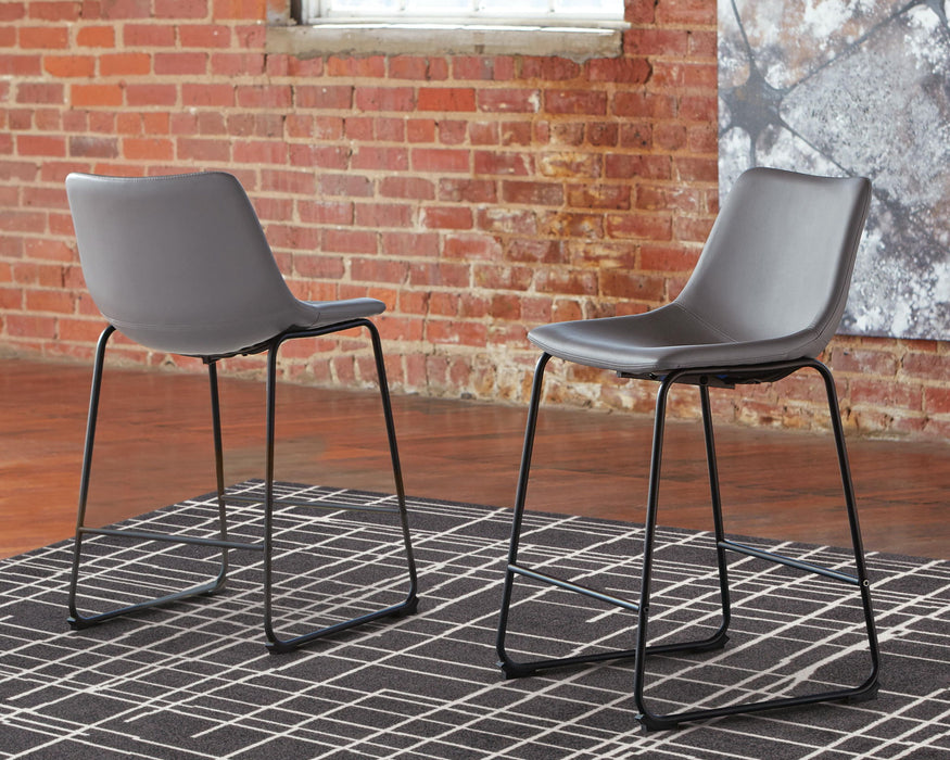 Set of two Ashley Furniture Centiar upholstered barstools with wooden legs and padded seats, ideal for kitchen or bar area.