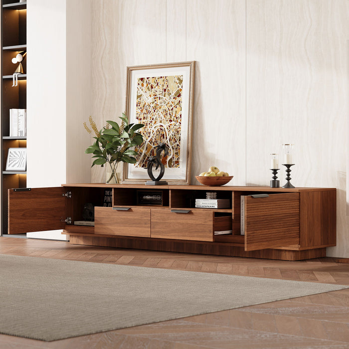 Giga TV stand with deep drawers, cable management, and soft closing hinges, showcasing a modern entertainment center design.