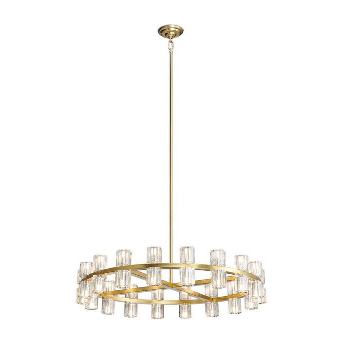 HomeRoots wagon wheel multi-light metal chandelier with gold finish and clear shades hanging from a rustic frame.