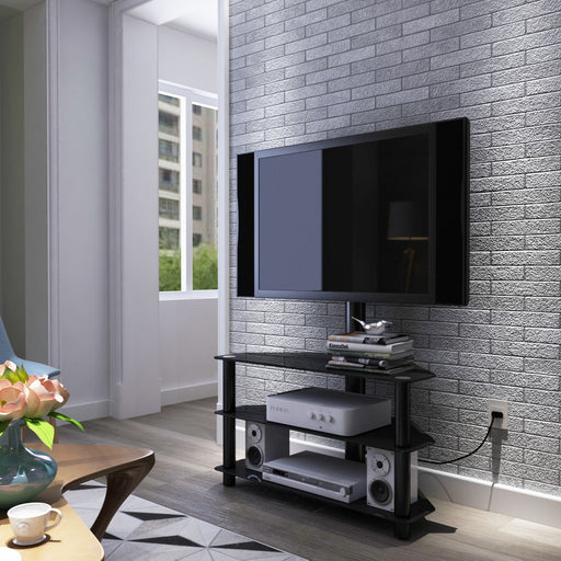 Black Giga 43.3-inch multi-function TV stand with adjustable height, swivel, and three tiers for versatile media display.