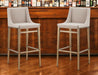 Set of two beige and gold stainless steel bar height chairs by HomeRoots, featuring modern design and comfortable seating.