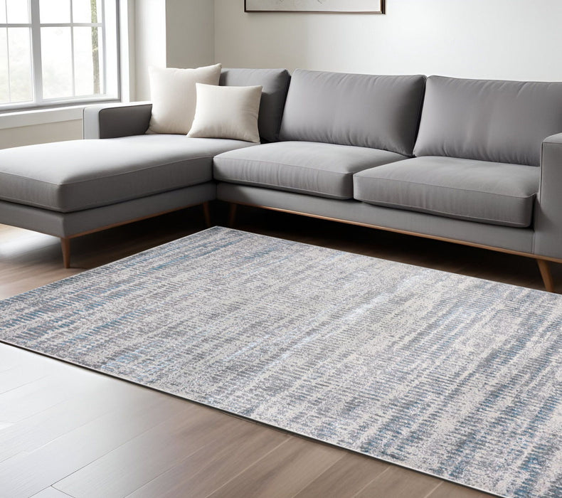 7' x 10' Abstract Stain Resistant Area Rug - Blue Gray And Ivory
