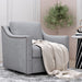 Giga 360-degree swivel armchair with skin-friendly fabric, ergonomic design, brass nail decorative accents, modern lounge chair