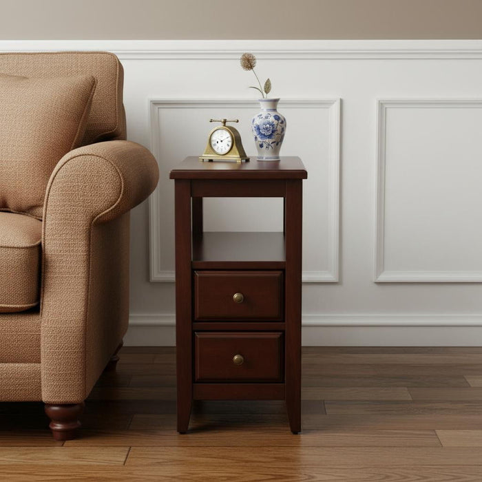 Dark brown manufactured wood end table with two drawers and a shelf, ideal for living room or bedroom decor.
