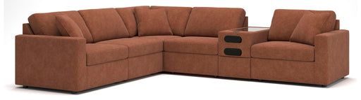 Signature Design by Ashley Modmax 6-piece stationary sectional sofa with plush cushions and modern design, shown in a cozy living room setting.